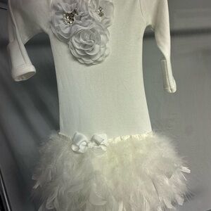 Elegant White Dress with Floral and Feather Details